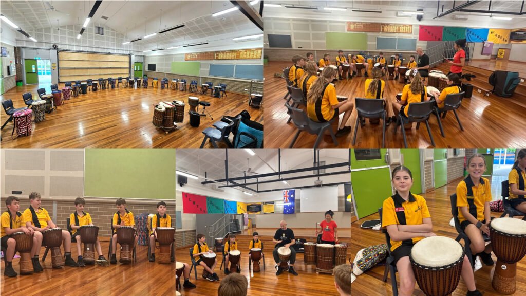 students enjoying drumming